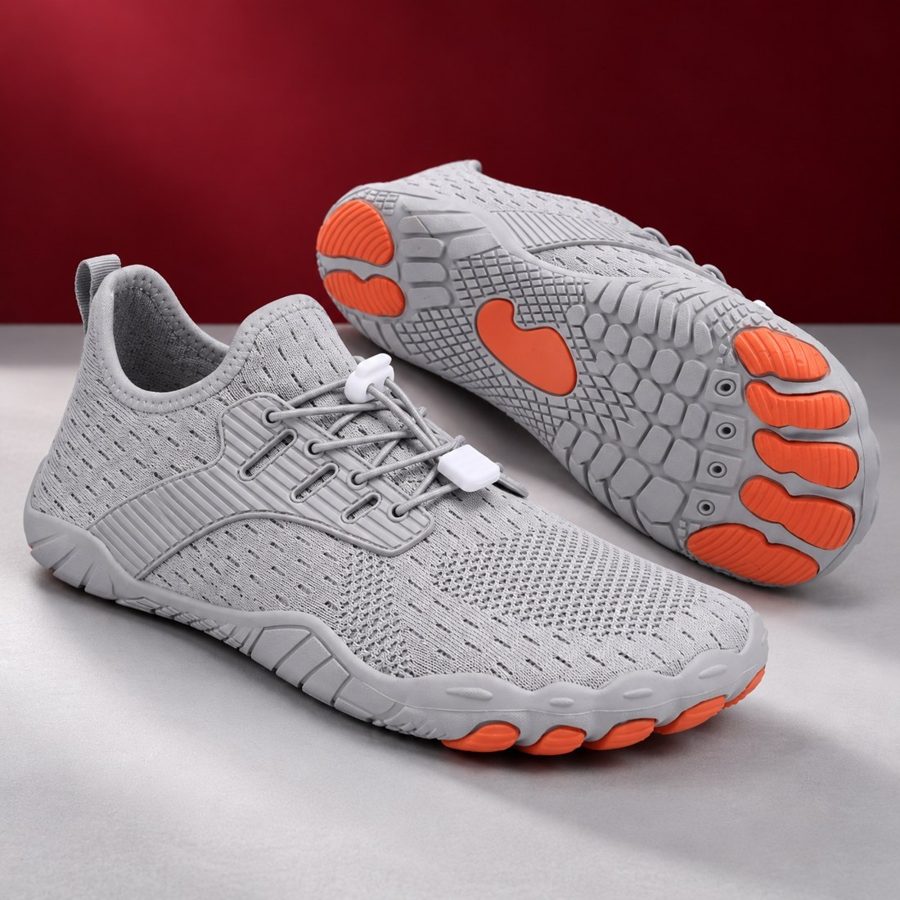 Grey Relief Walker barefoot shoes showing the knit upper and orange tread